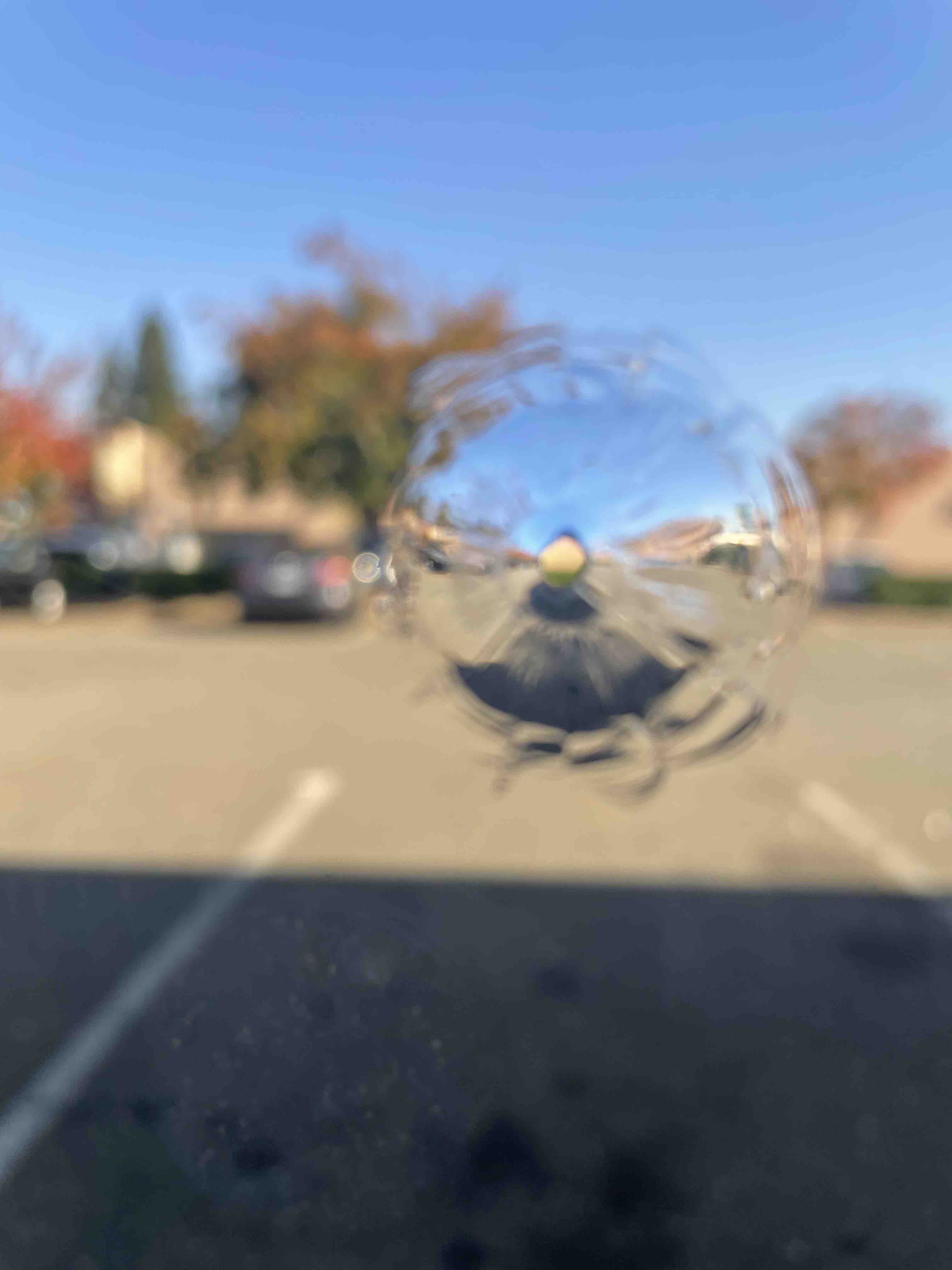 Bullet Proof Glass - Image of Small Hole in Window